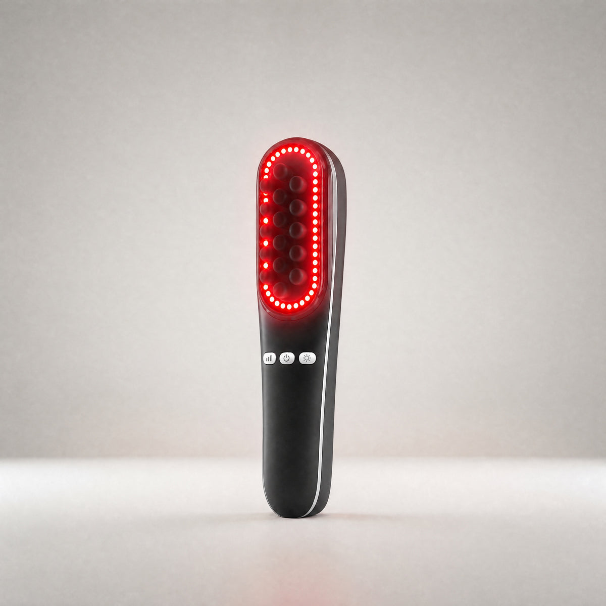 SNOZES Scalp Spa Massager with its ring of red light switched on